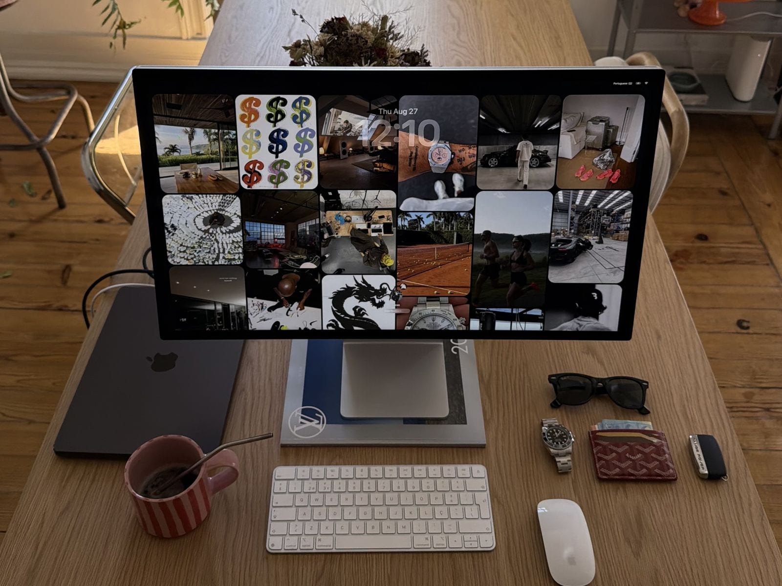 VisionWall on a Studio Display on a wooden desk